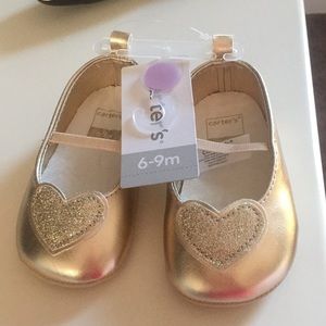 Carter’s gold baby shoes